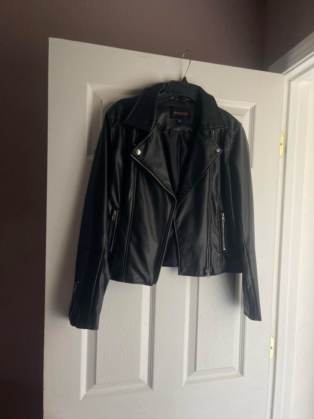 Black leather jacket with zipper details